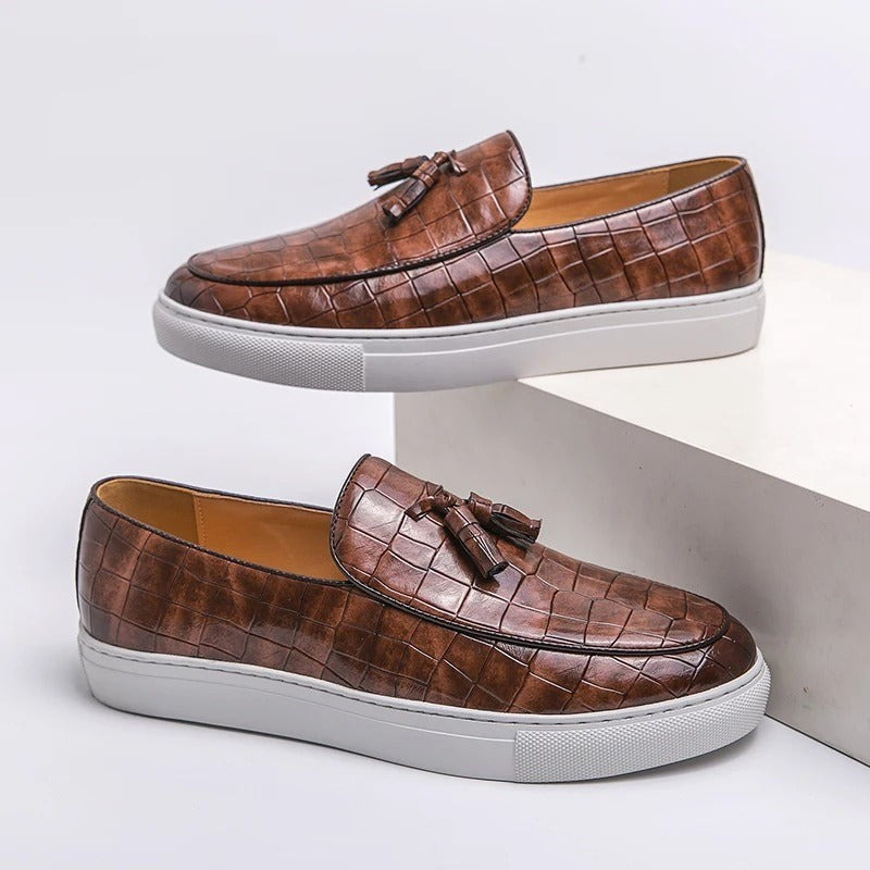 Vestralo Passero brown croc-embossed leather tassel loafers, side profile on white cupsole sneaker sole