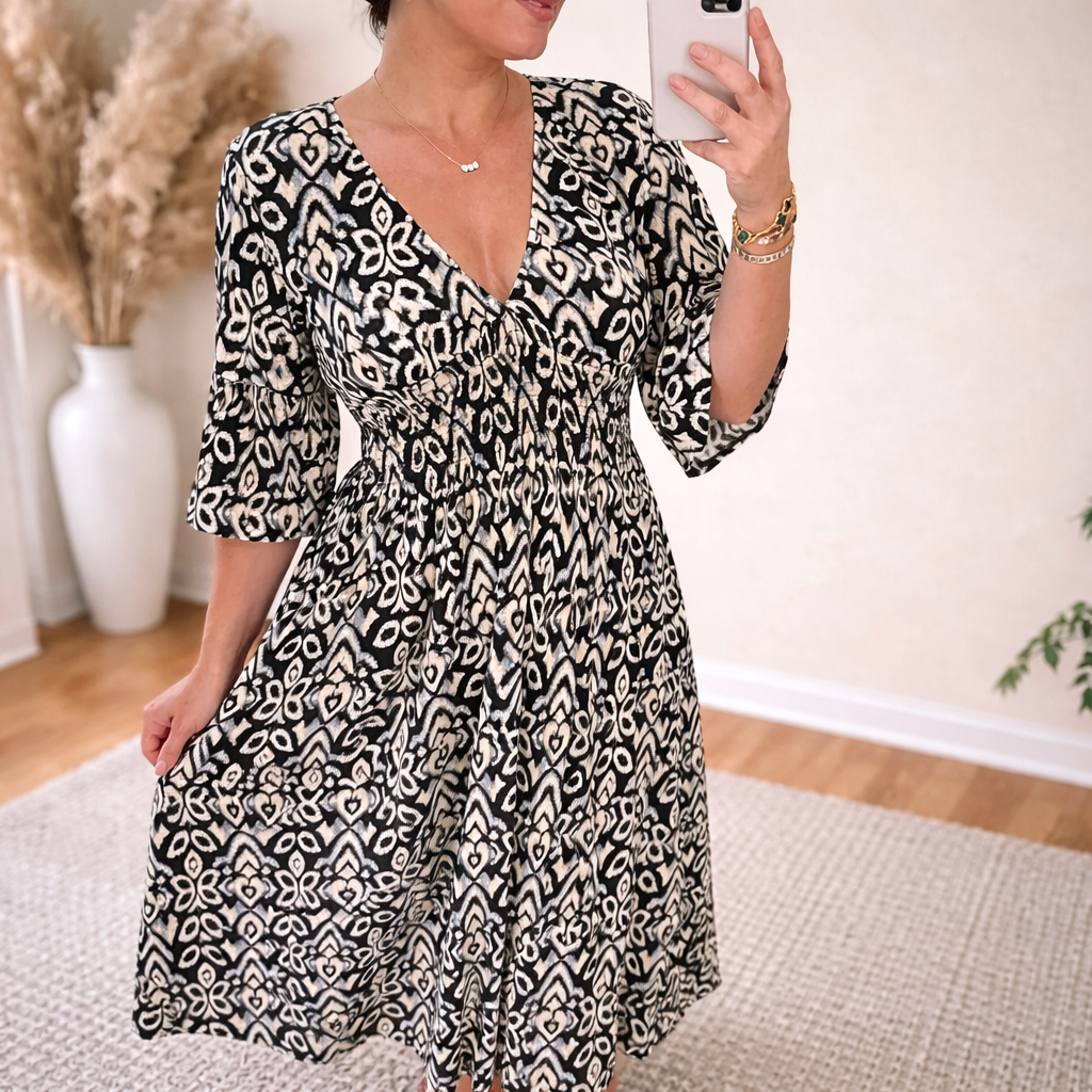 Black ikat print Kasia women's A-line V-neck maxi dress, front view on model
