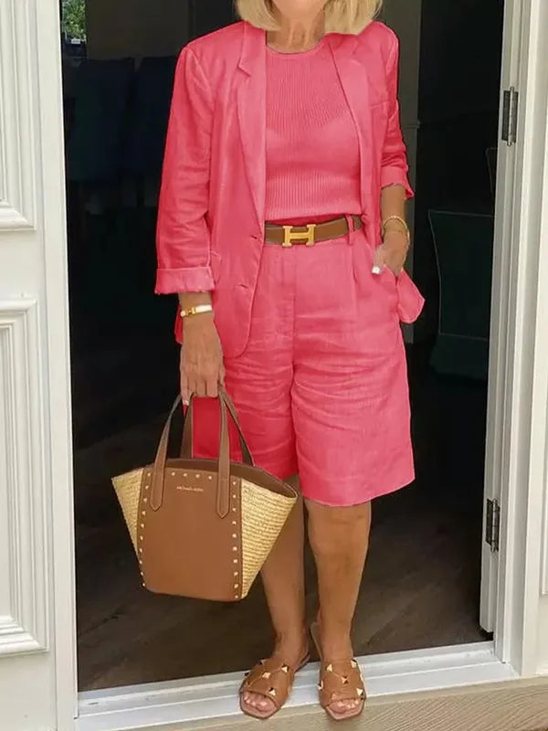 Nastassia Women's Blazer Shorts Two-Piece Set in coral pink, front view on model
