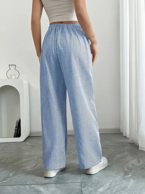 Blue Boho Beach Flare Trousers back view showing elastic waist and wide hem