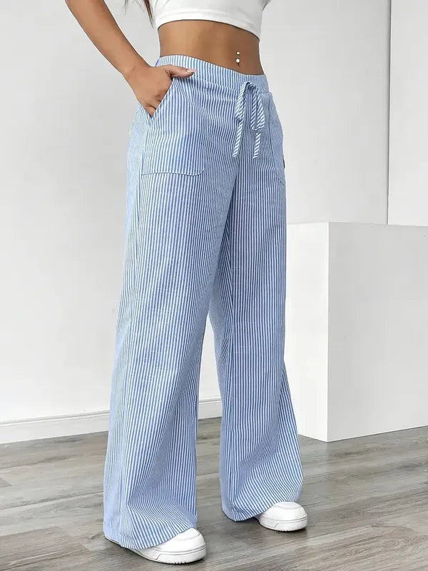Blue Boho Beach Flare Trousers three-quarter view showing ribbed stripe texture