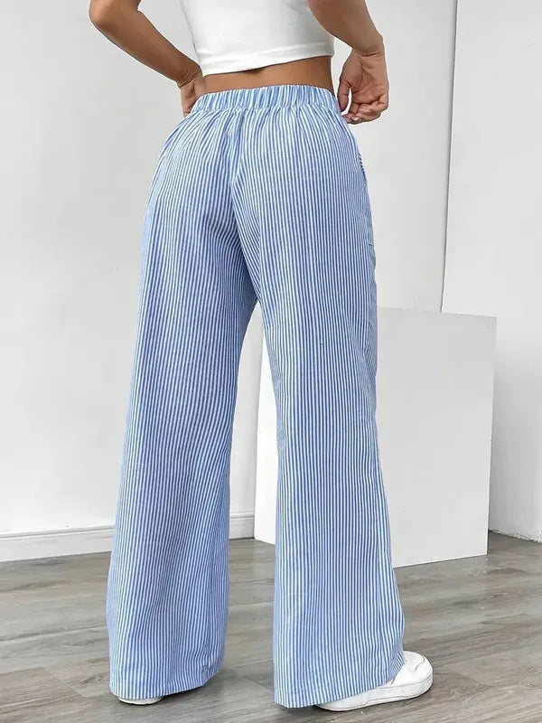 Blue Boho Beach Flare Trousers rear view with gathered waistband and long flare