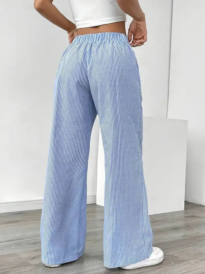 Blue Boho Beach Flare Trousers rear view with gathered waistband and long flare