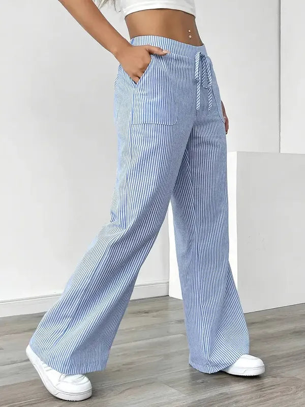 Blue Boho Beach Flare Trousers side profile view with drawstring tie detail