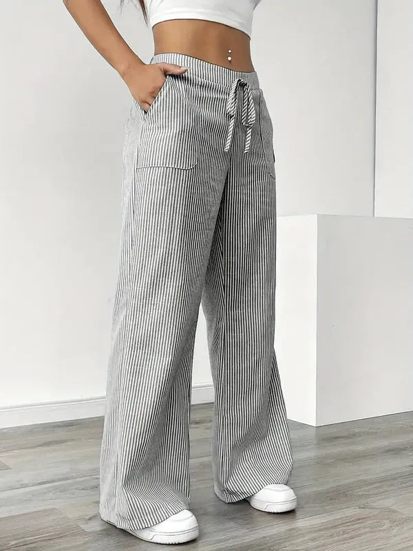 Gray Boho Beach Flare Trousers three-quarter view showing patch pocket detail