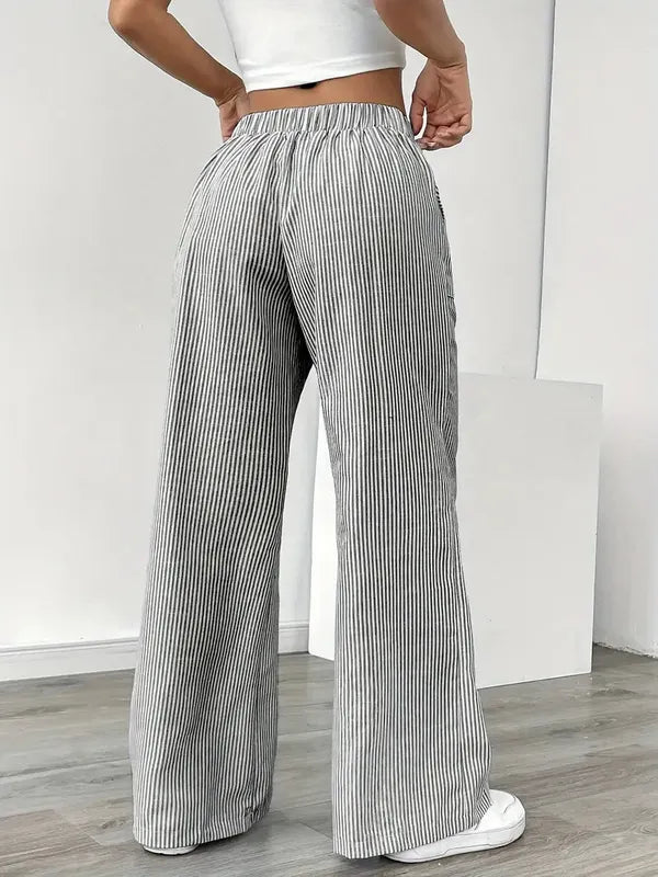 Gray Boho Beach Flare Trousers rear view showing gathered back waist and flare
