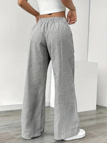 Gray Boho Beach Flare Trousers rear view showing gathered back waist and flare