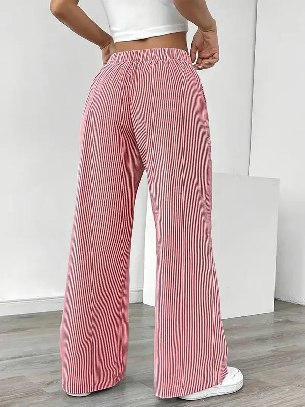 Pink Boho Beach Flare Trousers rear view with gathered elastic back waistband