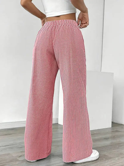 Pink Boho Beach Flare Trousers rear view with gathered elastic back waistband