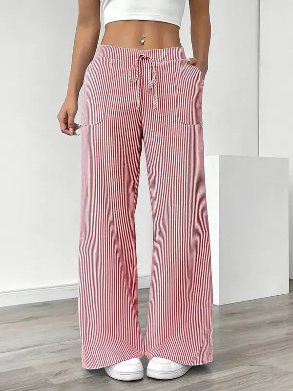 Pink Boho Beach Flare Trousers front view with tie waist and vertical rib stripe
