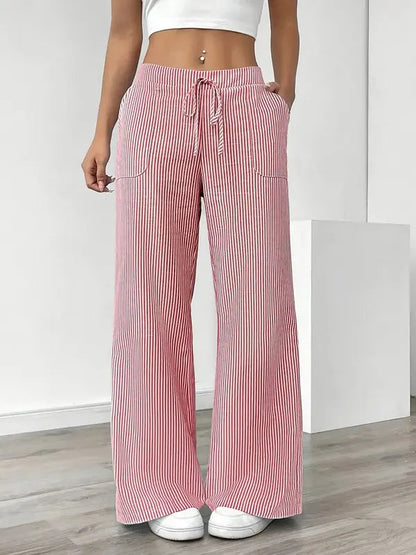 Pink Boho Beach Flare Trousers front view with tie waist and vertical rib stripe