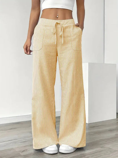 Yellow Boho Beach Flare Trousers front view with drawstring waist and striped rib