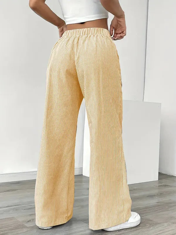 Yellow Boho Beach Flare Trousers back view with elastic waistband and wide leg