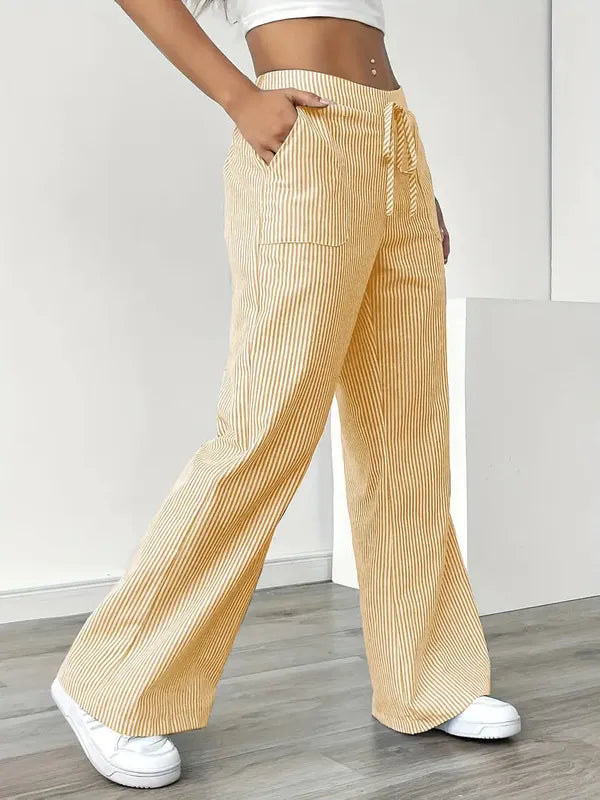 Yellow Boho Beach Flare Trousers side angle view showing patch pocket and flare