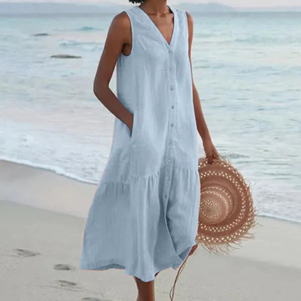 Blue Lovisa women's button-down midi dress, front view on model by the sea