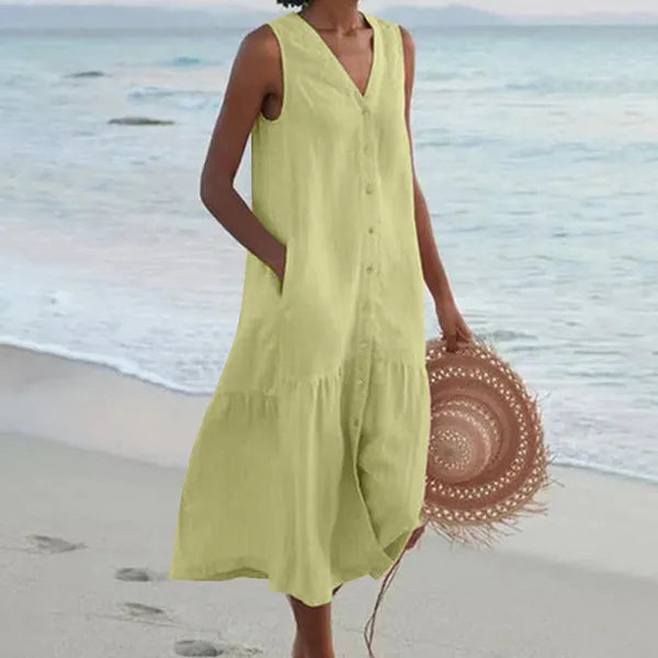 Light yellow Lovisa women's button-down midi dress, beach front view on model