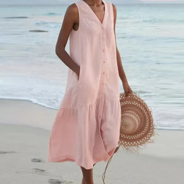 Pink Lovisa women's button-down midi dress, full-length front view on the beach