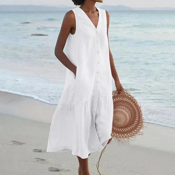 Lovisa women's button-down midi dress in white, beach front view with straw hat