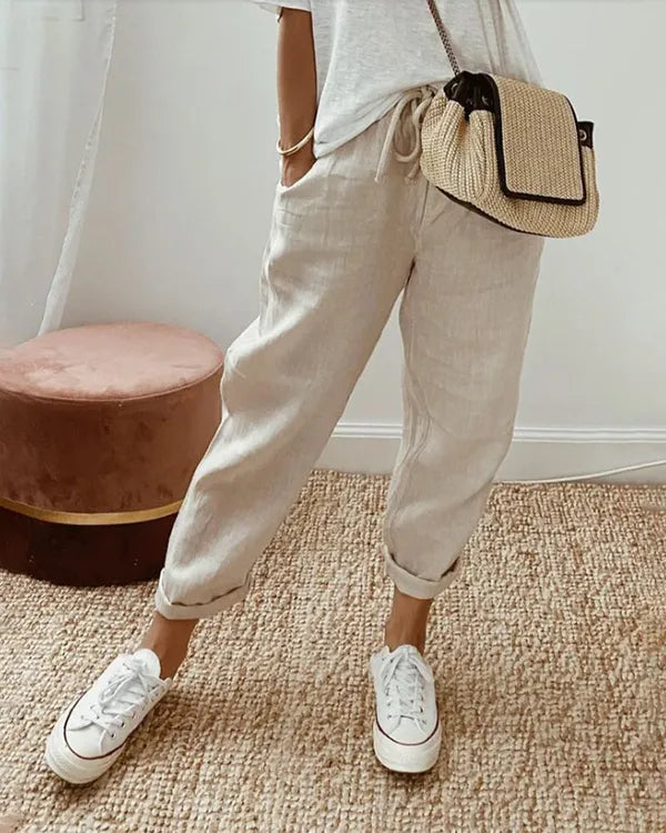 Beige Coastal Tapered Lounge Pants front view with drawstring waist and rolled cuff