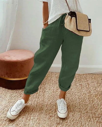 Green Coastal Tapered Lounge Pants front view with drawstring tie and rolled hem