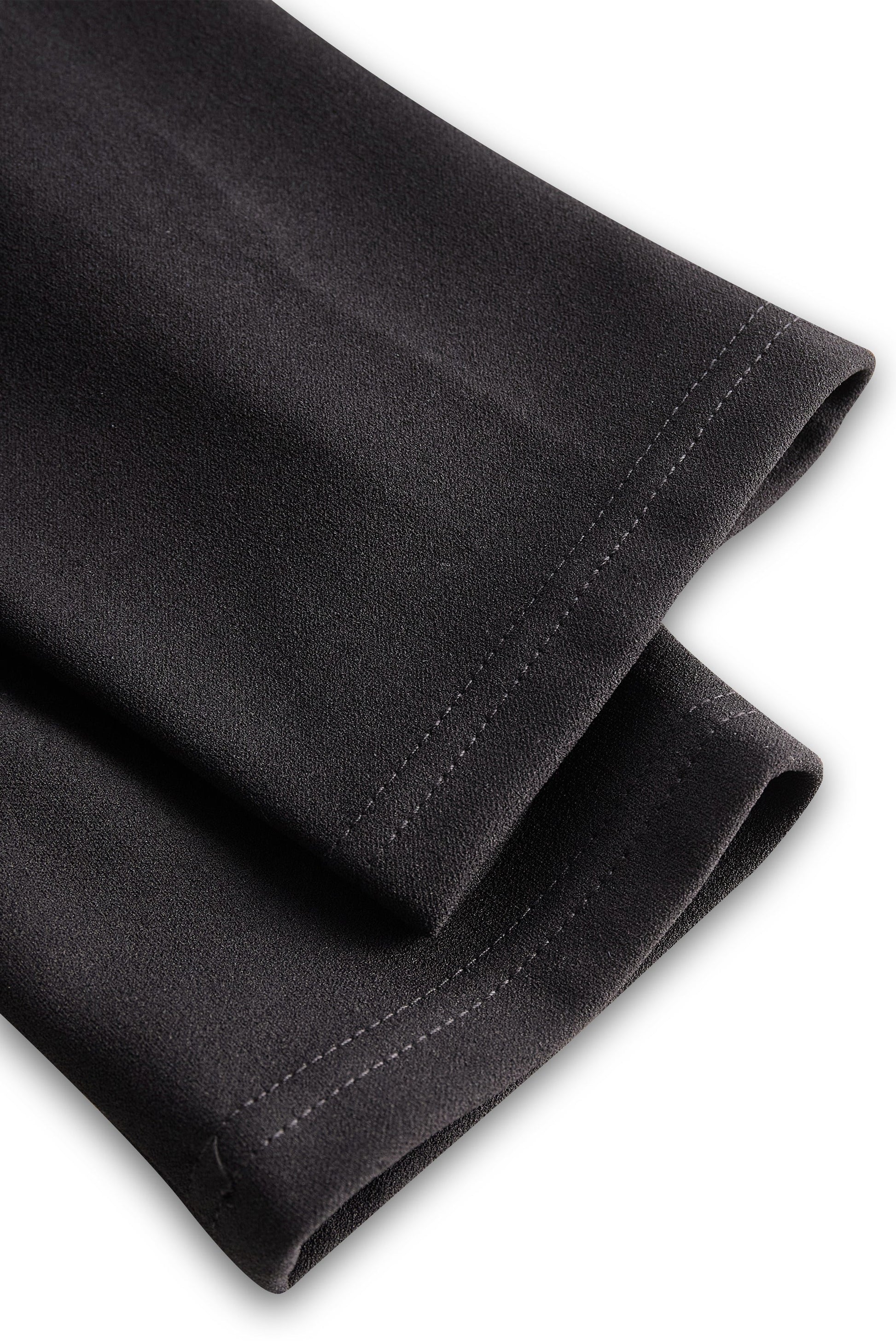 Close-up of the sleeve cuffs on the Camille women's black cocktail midi dress