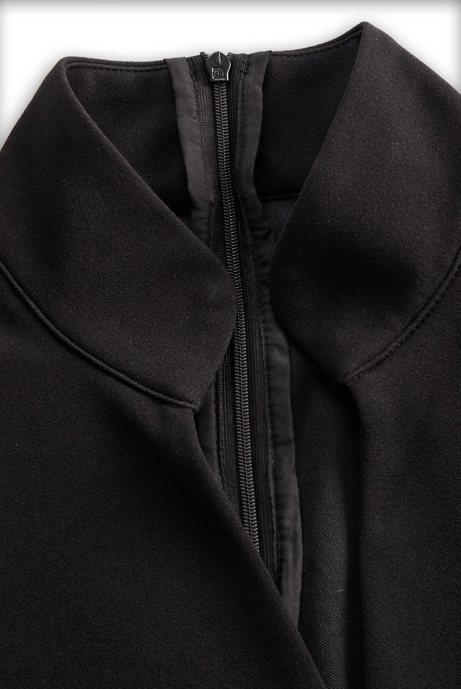 Detail of the collar and back zip of the Camille women's black bodycon midi dress