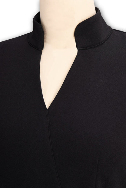 Stand collar and V neckline detail of the Camille women's black midi dress