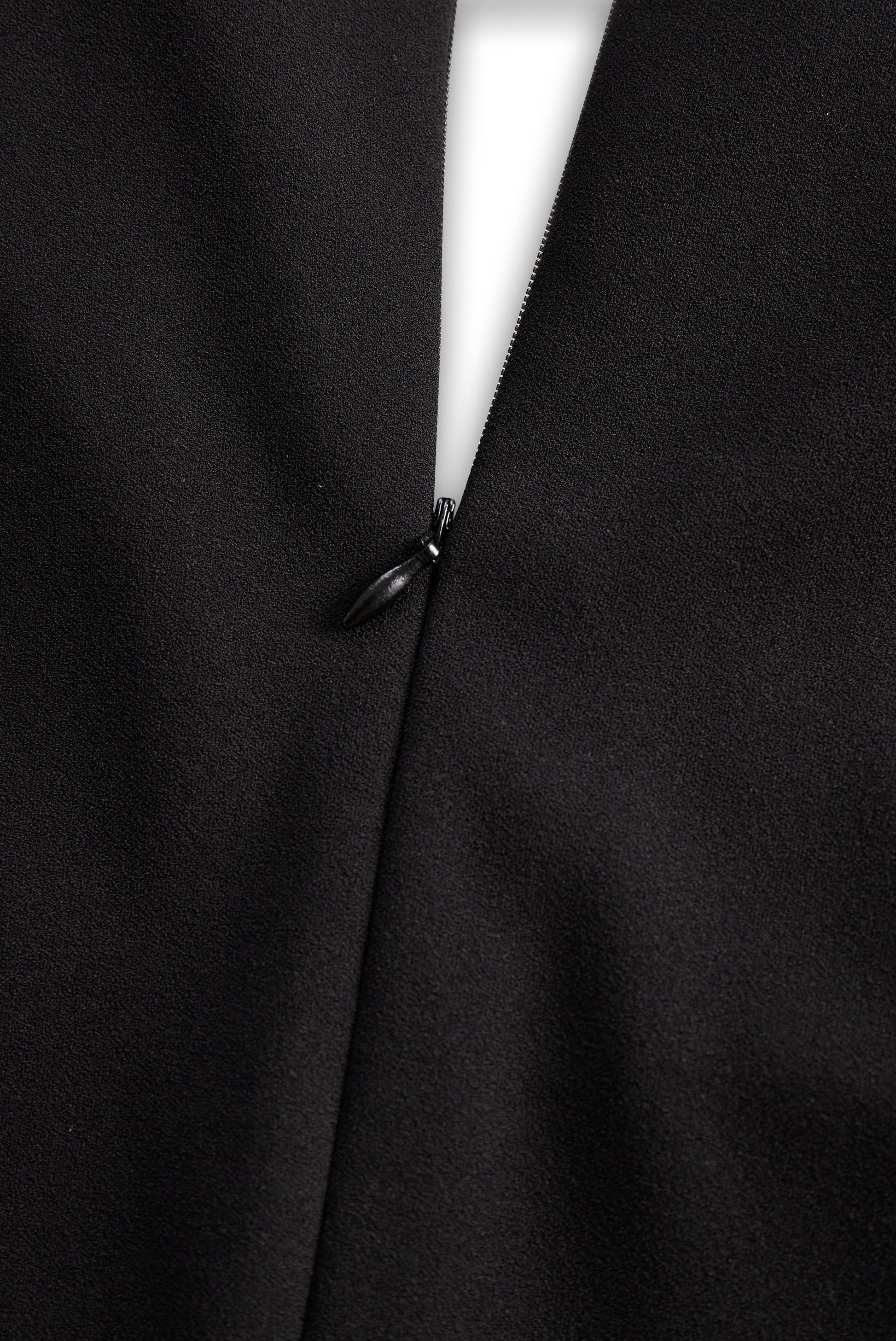 Back zip closure detail on the Camille women's black cocktail bodycon midi dress