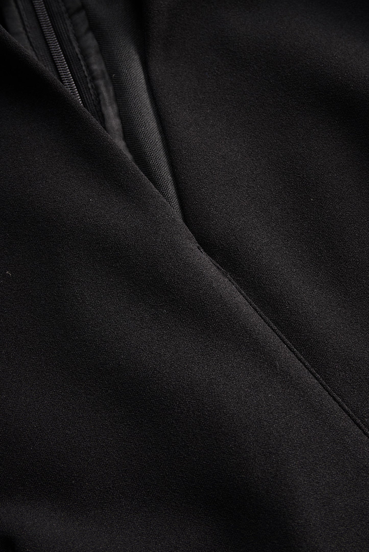 Wrap seam detail of the Camille women's black cocktail bodycon midi dress