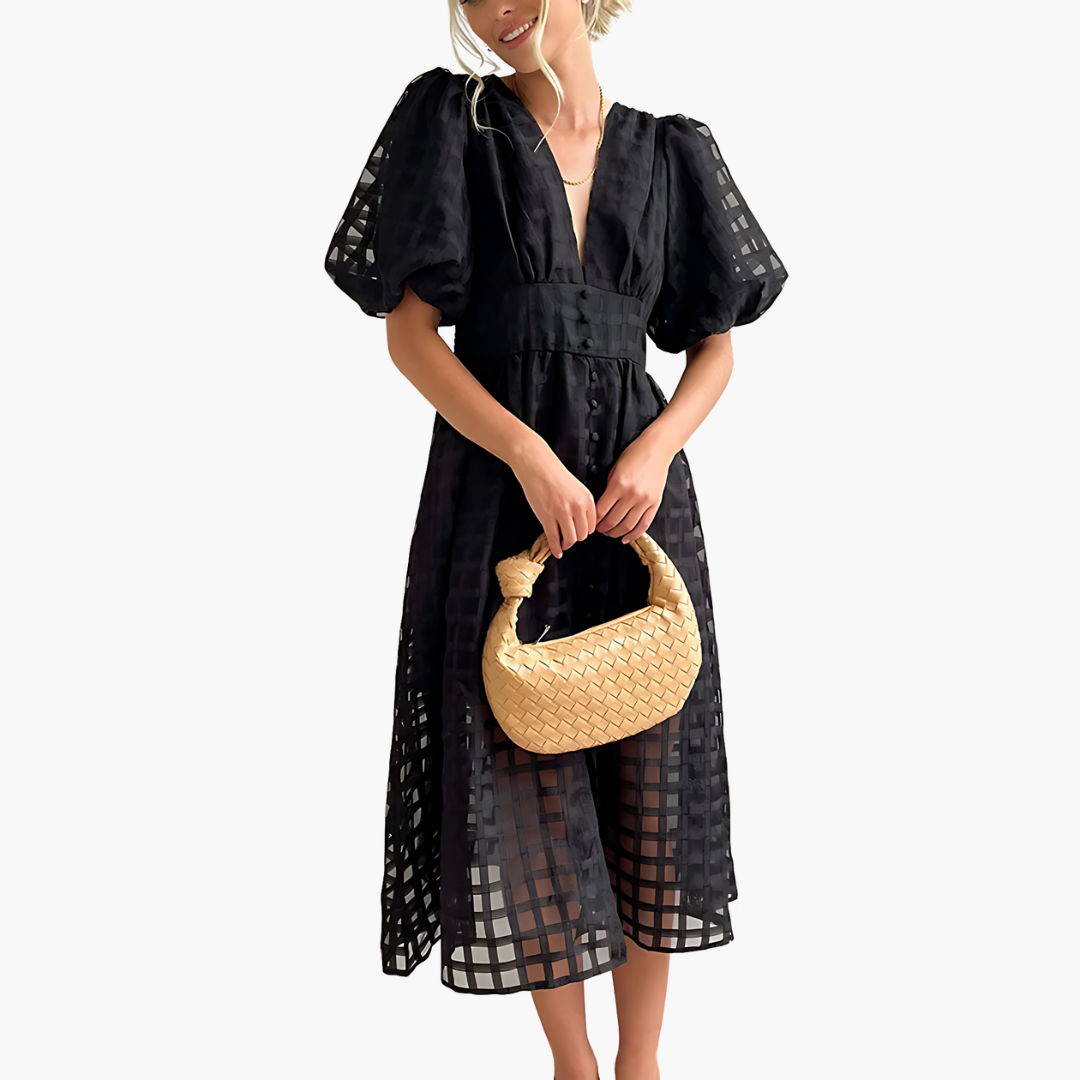 Black Aurelie women's cocktail puff sleeves midi dress, front view with tote bag