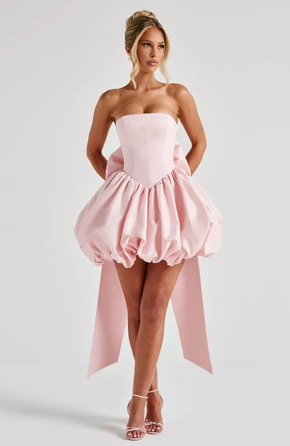 Front view of the light pink Clemence strapless satin bubble mini dress