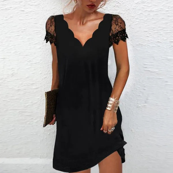 Vivienne women's cocktail mini dress in solid black with lace sleeves, front view