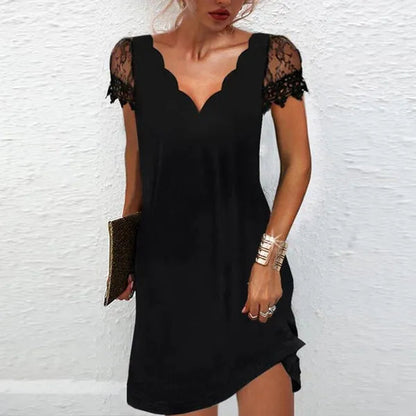 Vivienne women's cocktail mini dress in solid black with lace sleeves, front view