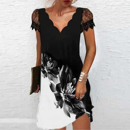 Vivienne cocktail mini dress in black and white floral colourway, front view