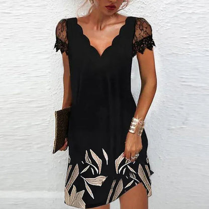 Vivienne cocktail mini dress in the leaf print colourway, front view on model