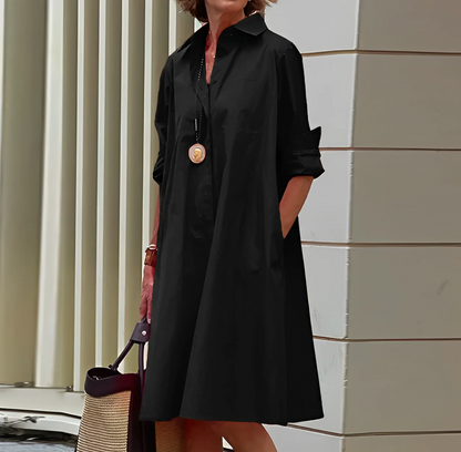 Black Women's Long Sleeve Midi Dress - Sunniva, collared shirt dress, front view on model outdoors