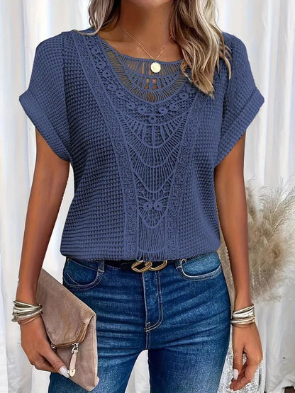 Svea Women's Crochet Knit Short Sleeve Top in navy blue, front view with lace panel