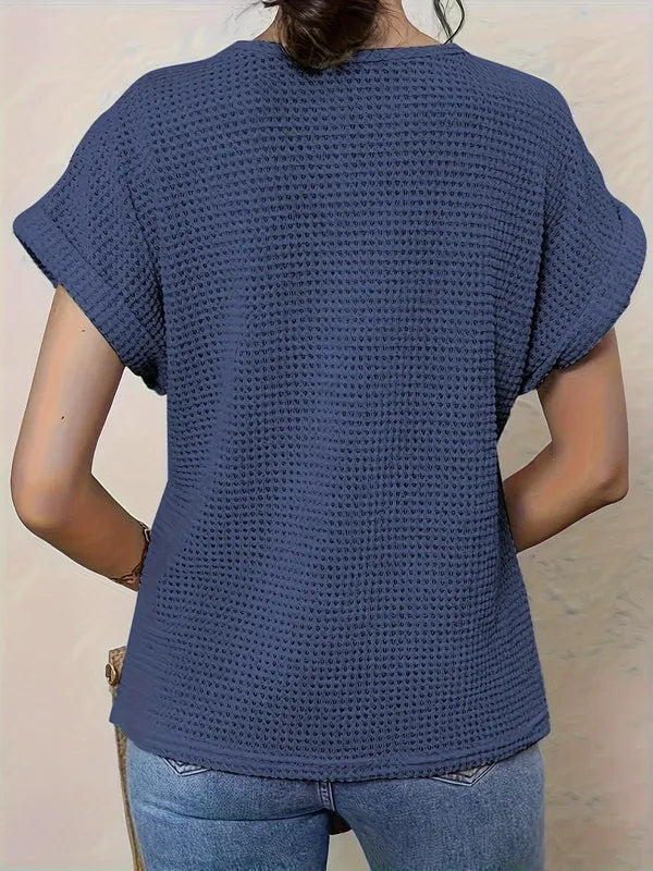 Svea Women's Crochet Knit Short Sleeve Top in navy blue, back view of waffle knit