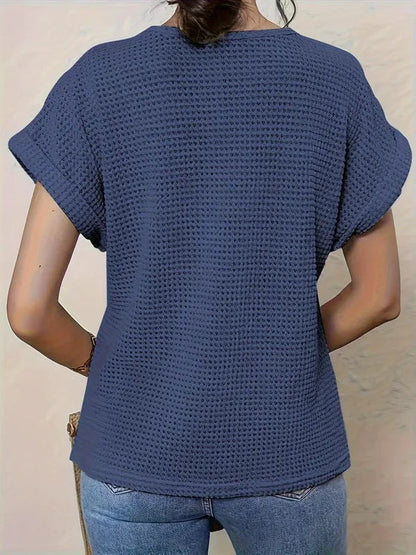 Svea Women's Crochet Knit Short Sleeve Top in navy blue, back view of waffle knit