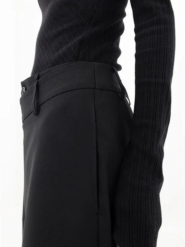 Detail of Black Drape Palazzo Pants side waist seam and overlapping drape panel