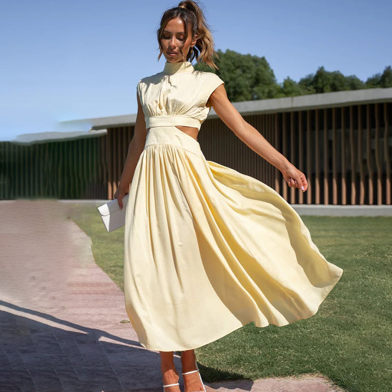 Women's Cut-Out Waist Maxi Dress in Yellow, front view outdoors - Mirella