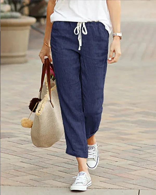 Madeline Women's Drawstring Linen Trousers in navy blue, front view on model