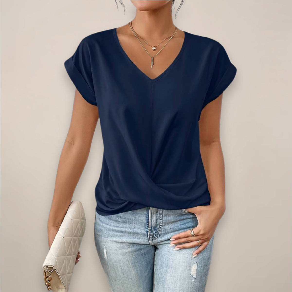 Women's Elegant Summer Blouse in navy Blue, front view styled with denim – Roksana
