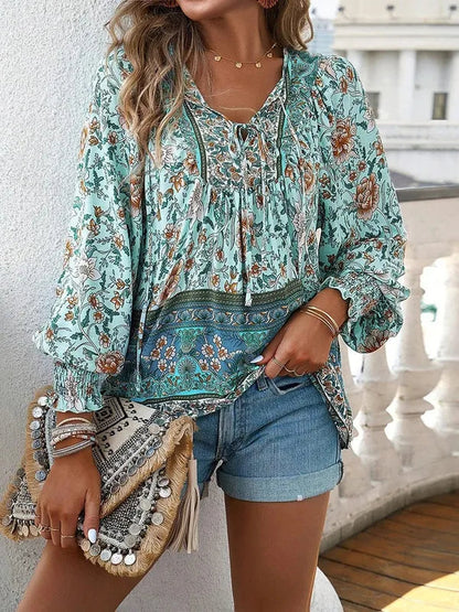 Women's Floral Long Sleeve Boho Blouse in Green, front view with denim shorts – Marzena