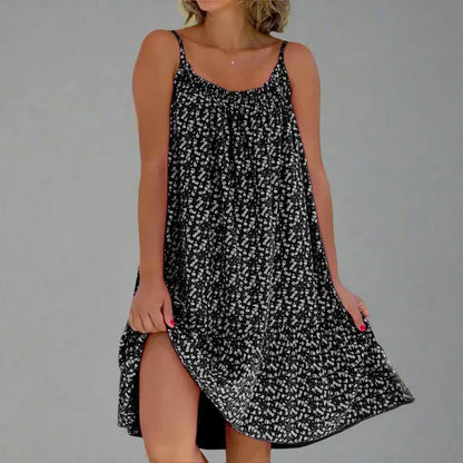 Ruby women's floral slip mini dress in black, front view on model