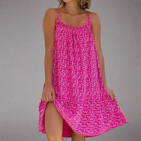 Ruby women's floral slip mini dress in magenta, front view on model