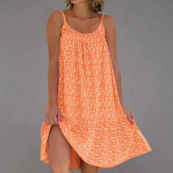 Ruby women's floral slip mini dress in orange, front view on model