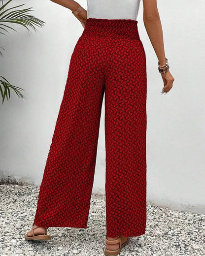 Lucie Women's Smocked Waist Palazzo Trousers in red floral print, back view