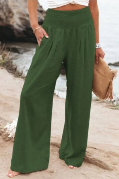 Bethany Women's Flowy Palazzo Trousers in army green, front view on model