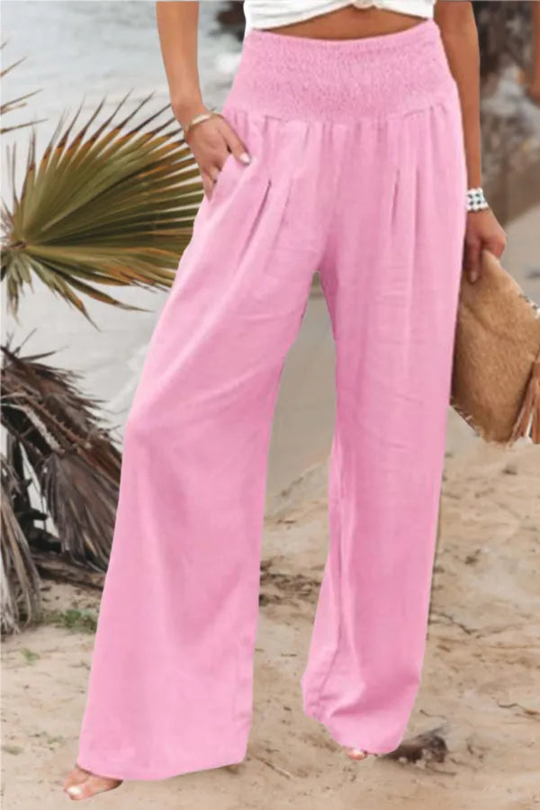 Bethany Women's Flowy Palazzo Trousers in pink, front view on model